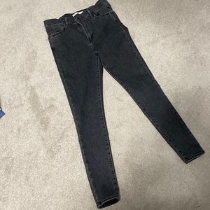 720 high rise super skinny black jeans